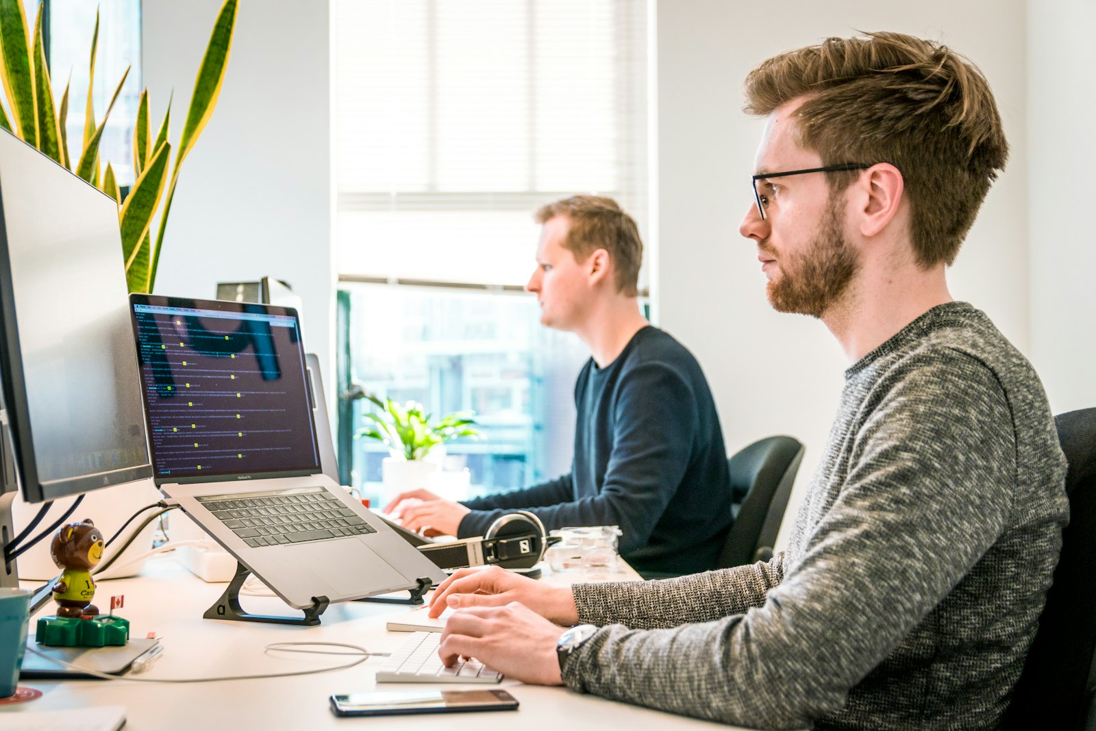 Engineering team collaborating on a sprint in a modern workspace